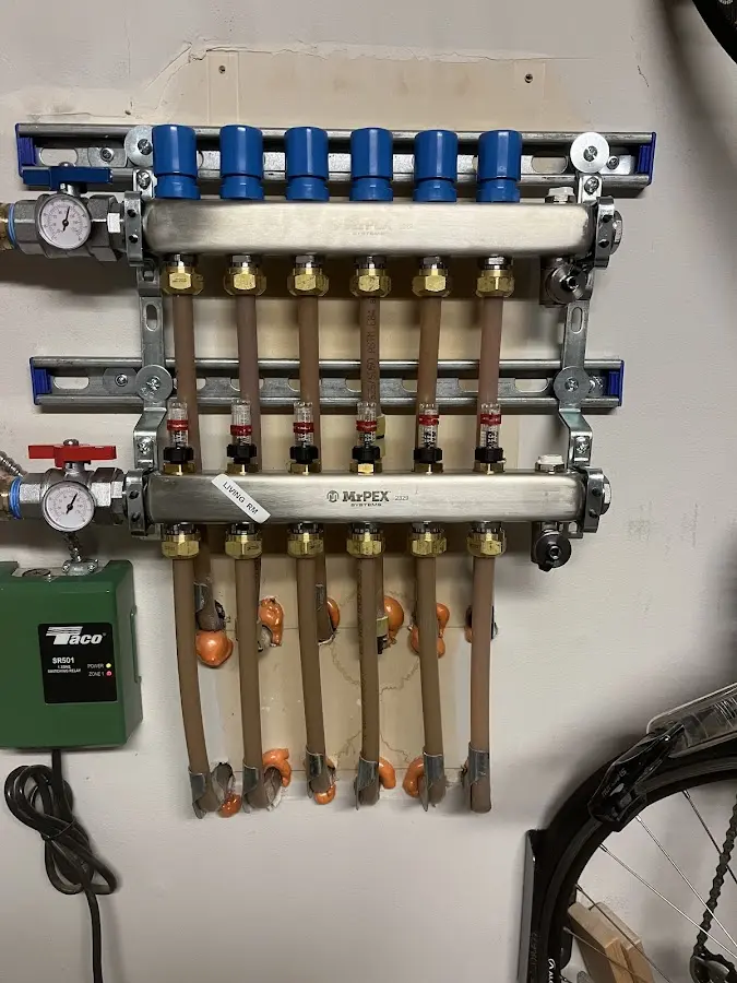 Plumber performing Water Heater Repair at a residential property in Enterprise